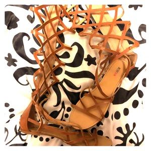 Just fab gladiators sandals that zip up the leg.